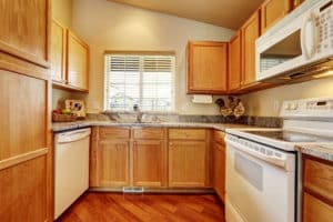 This is a small kitchen with lots of storage